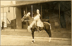 1910 Mrs. Ernest Cooper riding a horse